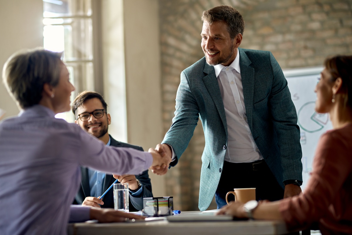 REVENATA business partners in a meeting